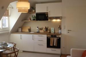 Kuchyň nebo kuchyňský kout v ubytování Gemütliches Boho Studio Apartment in der Altstadt Kronbergs