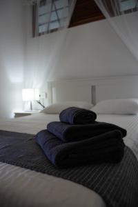 Postel nebo postele na pokoji v ubytování Dream's House