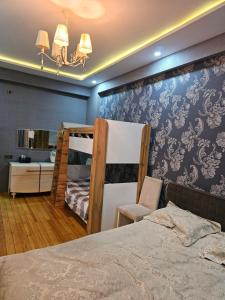 Ένα ή περισσότερα κρεβάτια σε δωμάτιο στο Jade's Apartment