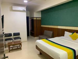 Letto o letti in una camera di Hotel BCP Suites