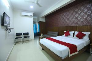 Letto o letti in una camera di Hotel BCP Suites