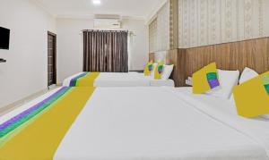 Letto o letti in una camera di Hotel BCP Suites