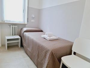 Krevet ili kreveti u jedinici u okviru objekta Re Lear Expo