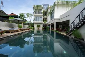 an image of a swimming pool at a hotel at Vihara The City of Temples in Siem Reap