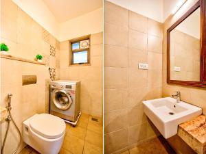 Koupelna v ubytování Cozy 2BHK Pool Apartment in candolim