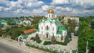 a church with a gold dome on top of it at Lenin Guest House & Tours in Tiraspol