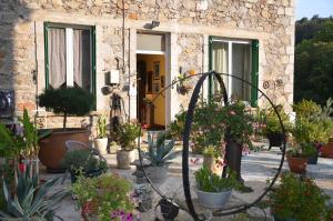 Zahrada ubytování Chambre Bounty, B&B, cuisine privée, lit queen size, terrasse, parking, garage