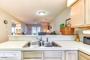 A kitchen or kitchenette at Little River Condo with Pool Access 5 Mi to Beach