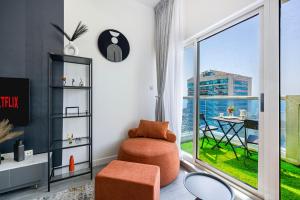 A seating area at Sleek nordic style seaview condo