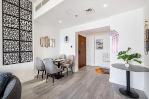 A seating area at Sleek nordic style seaview condo