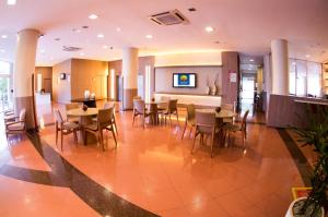 En restaurant eller et andet spisested på Comfort Hotel Manaus