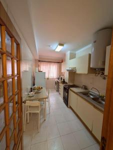 Η κουζίνα ή μικρή κουζίνα στο Guest House Da Mata3