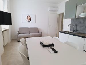 TV a/nebo společenská místnost v ubytování Re Lear Expo + 37 fotografií