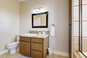 a bathroom with a sink and a toilet at Hallie House MCA 314 in Manzanita +18 photos