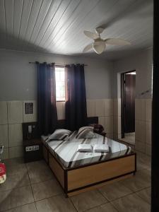 Uma cama ou camas num quarto em Hotel jacui