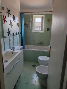 Koupelna v ubytování Flat on Roman Rooftop