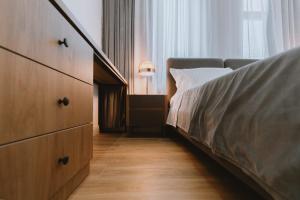 Postel nebo postele na pokoji v ubytování Dyrmo Hotel