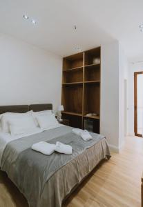 Postel nebo postele na pokoji v ubytování Dyrmo Hotel