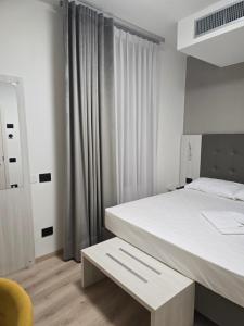 Voodi või voodid majutusasutuse Albergo Al Gambero toas