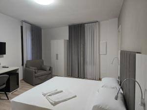 Voodi või voodid majutusasutuse Albergo Al Gambero toas