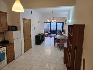 Η κουζίνα ή μικρή κουζίνα στο Puzzle flat 2