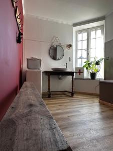 Łóżko lub łóżka w pokoju w obiekcie La Casa Rosa