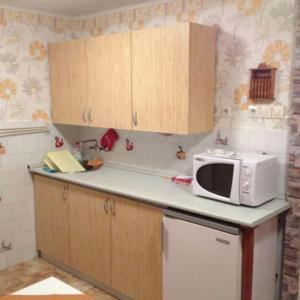 Kuchyňa alebo kuchynka v ubytovaní Merkl Apartman- Harkány + 2 fotografie