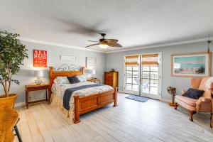 a bedroom with a bed and a ceiling fan at Pet-Friendly Riverside Retreat with Private Spa! in Riverside +24 photos