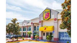 a fast food restaurant with a sign on the front of it at Super 8 in Stafford