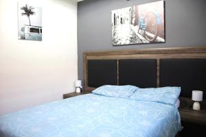 Postel nebo postele na pokoji v ubytování The 20th