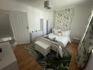 Ένα ή περισσότερα κρεβάτια σε δωμάτιο στο Lonsdale Terrace - 3 Bedrooms - Sleeps 6