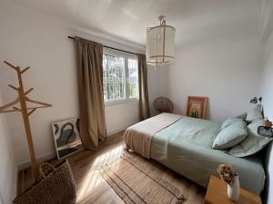 Postel nebo postele na pokoji v ubytování O Pedrido Beach House