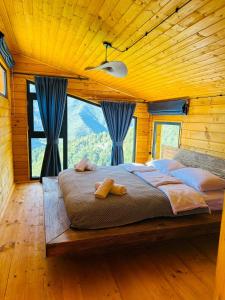 Voodi või voodid majutusasutuse Hill Inn toas