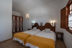 Posteľ alebo postele v izbe v ubytovaní Hotel Rural Era de la Corte - Adults only