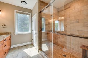 a bathroom with a shower and a glass shower stall at Lake Anna Home with Dock and Private Shoreline! in Bumpass +34 photos