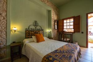 Posteľ alebo postele v izbe v ubytovaní Hotel Rural Era de la Corte - Adults only