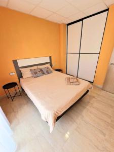 Voodi või voodid majutusasutuse Apartament Sant Jaume D'enveja toas