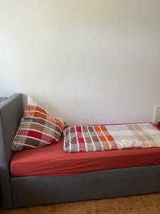 Ein Bett oder Betten in einem Zimmer der Unterkunft Aventur Studio 212 Am Rotharrsteig