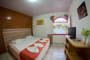 Postel nebo postele na pokoji v ubytování Cosmopolitan Hostel