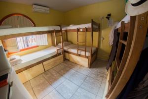 Postel nebo postele na pokoji v ubytování Cosmopolitan Hostel
