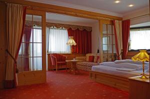Postel nebo postele na pokoji v ubytování Hotel Bergland
