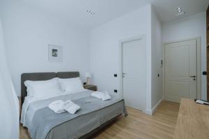Postel nebo postele na pokoji v ubytování Dyrmo Hotel