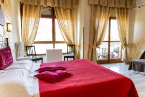 A bed or beds in a room at La Stazione Del Vaticano