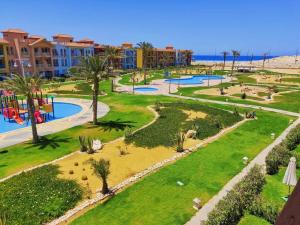 an aerial view of a playground at a resort at PORTO MATROUH chalet families only in Marsa Matruh