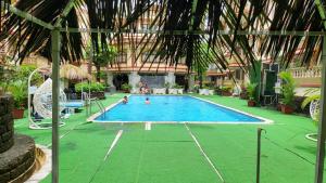 Tiện nghi tennis/bóng quần (squash) tại 1BHK POOL VIEW APARTMENT - Candolim Resort