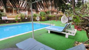 Hồ bơi trong/gần 1BHK POOL VIEW APARTMENT - Candolim Resort