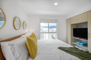 Postel nebo postele na pokoji v ubytování Upstay - NEW BUILD - Viva Jaco Condo w Epic Views