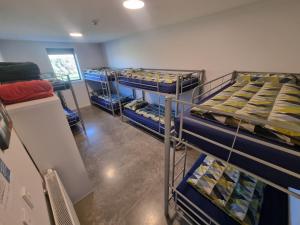 Letto o letti in una camera di Penny's Drop Inn