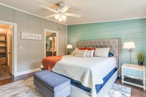 a bedroom with a bed and a ceiling fan at Upscale Lake Texoma Vacation Home 1 Mi to Marina! in Willow Spring