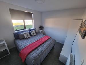 Letto o letti in una camera di Penny's Drop Inn